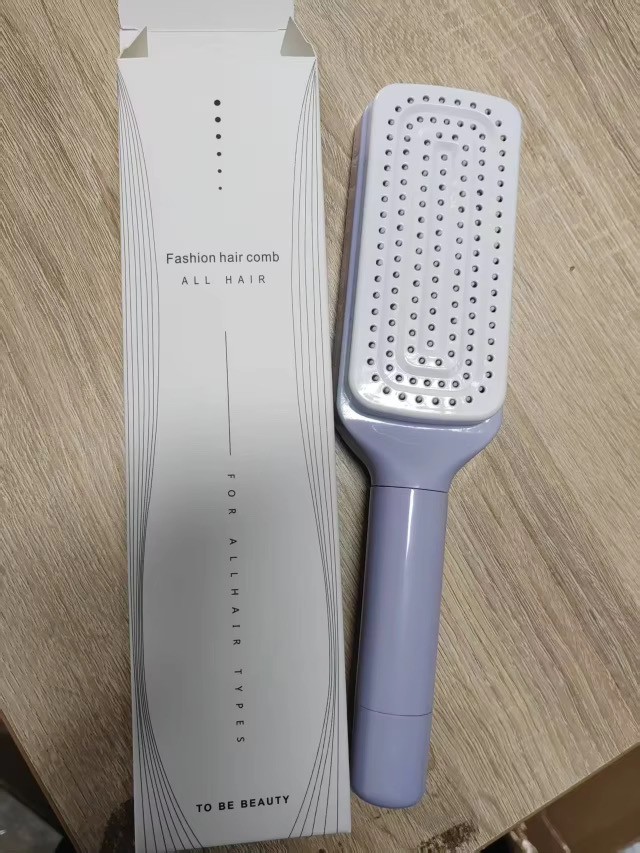 Brosse à cheuveux auto_nettoyante ,massante et antistatique